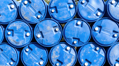 Blue barrels used for industrial waste management
