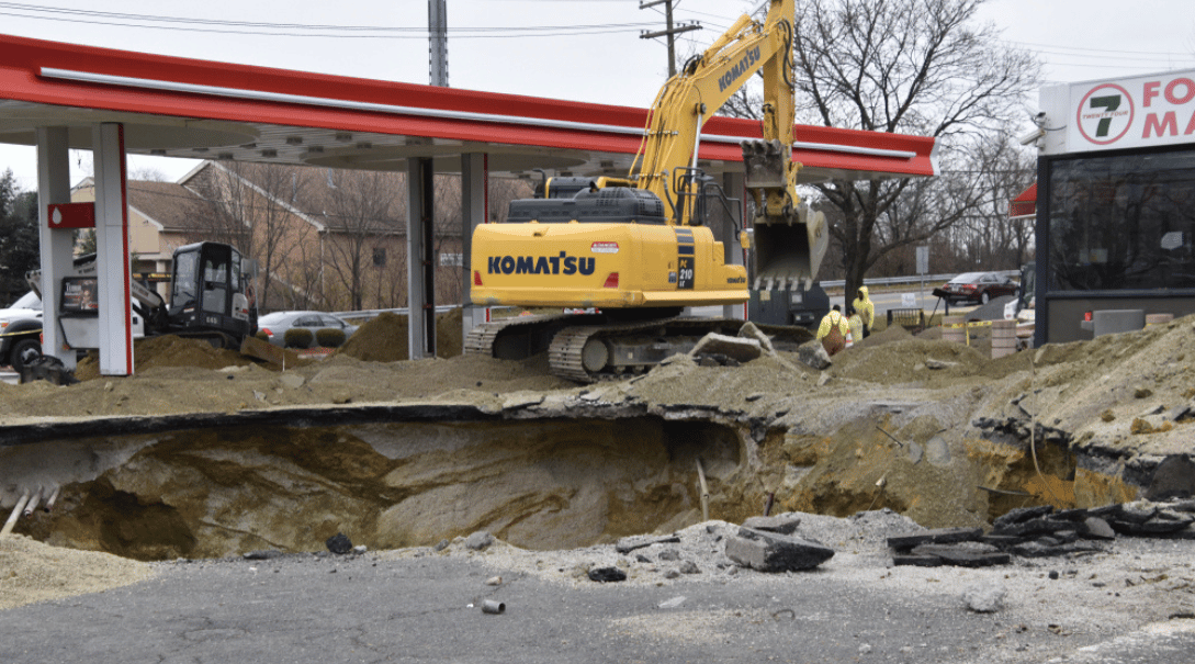 Bulldozer used to dig out underground storage tank that was leaking