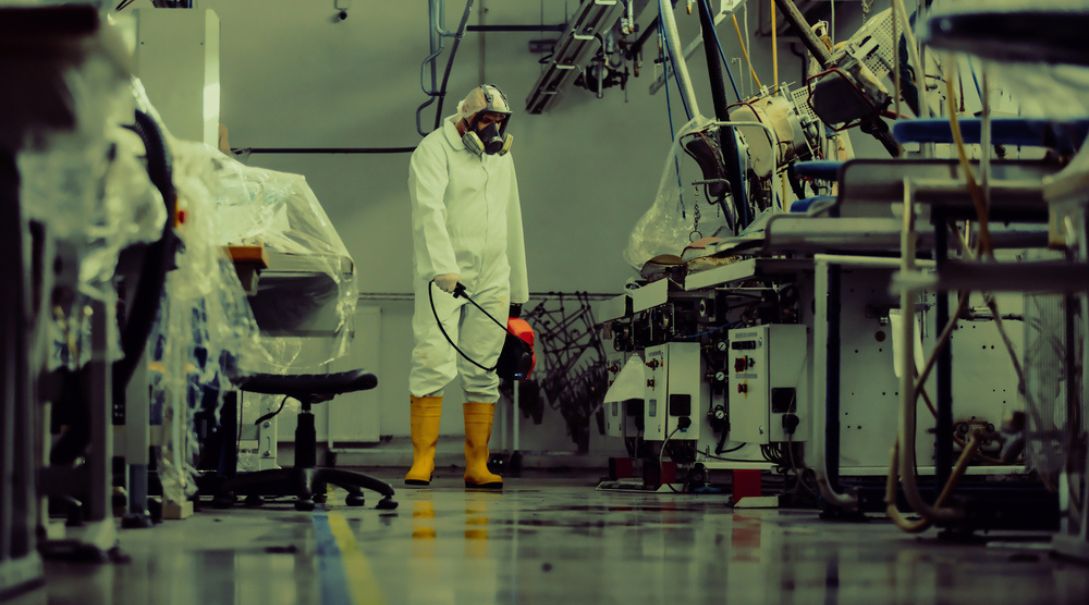 hazmat worker inside industrial facility