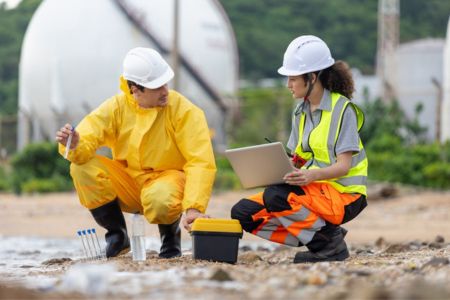 Environmental Scientists Testing Contaminated Water for Remediation